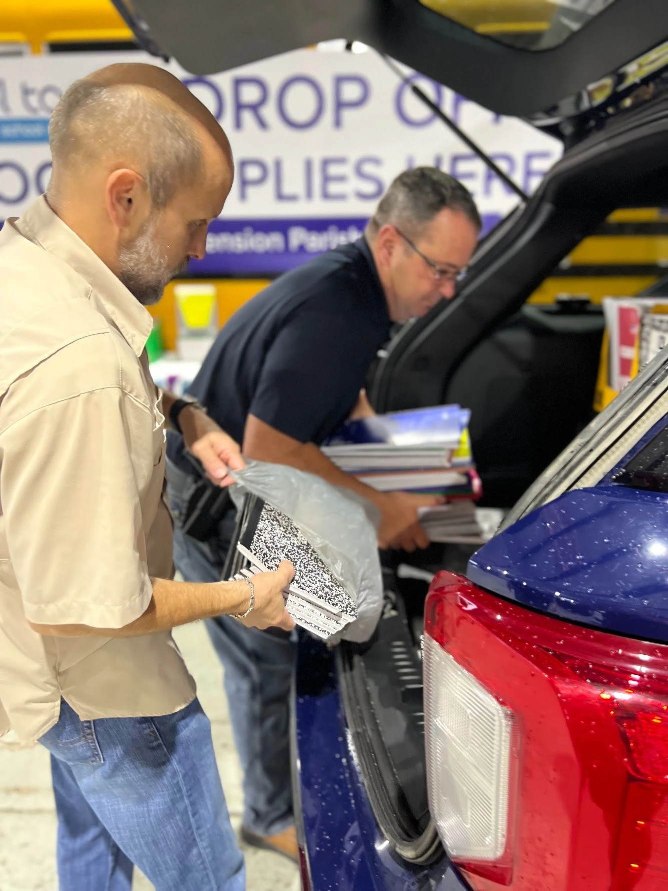 Volunteers unloading supplies